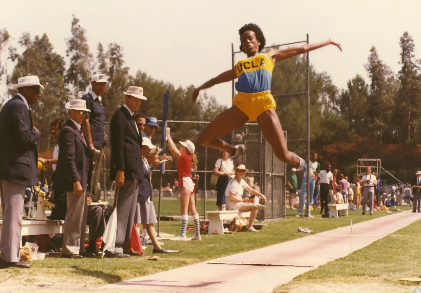 Jackie Joyner-Kersee competing in the long jump during her time at UCLA. She would go on to win a gold medal in the event at the 1988 Olympic Games in Seoul. UCLA Athletics