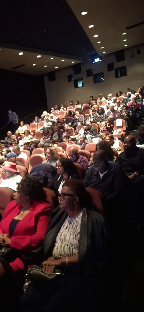 A sold-out audience engages with the program at the Gene Siskel Film Center.