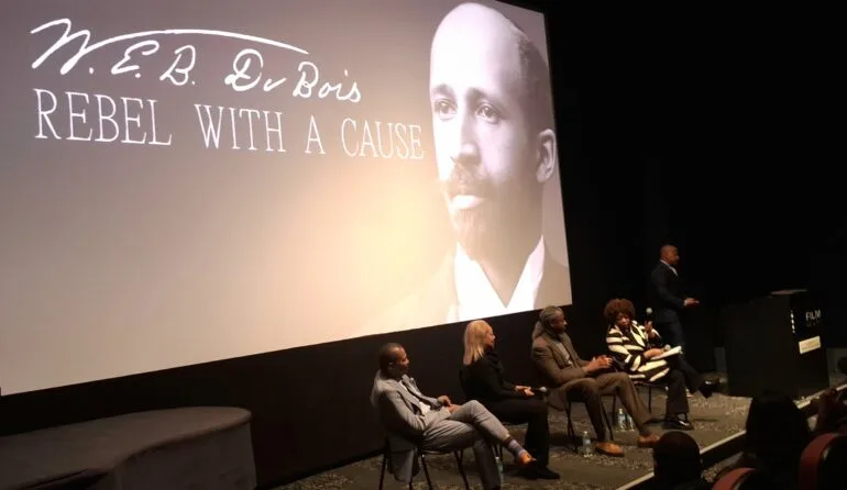 W.E.B. DuBois Film Screening Panel Wide Shot of Stage Partial Audience Phot By Dr. Tracey Bond Splash Magazine Worldwide